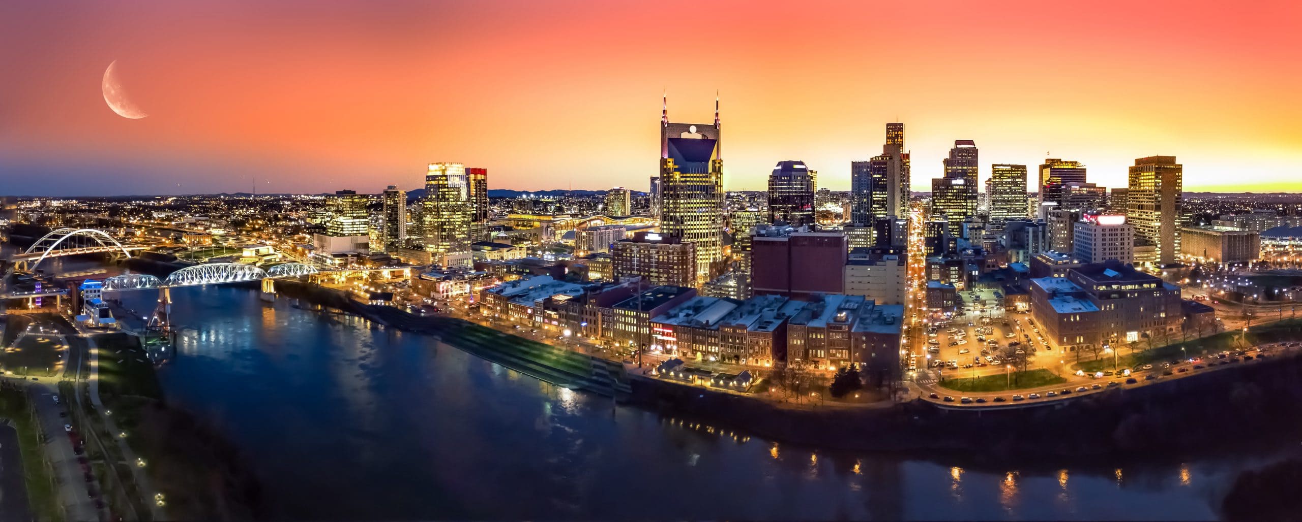 Panorama of a cityscape at sunset.