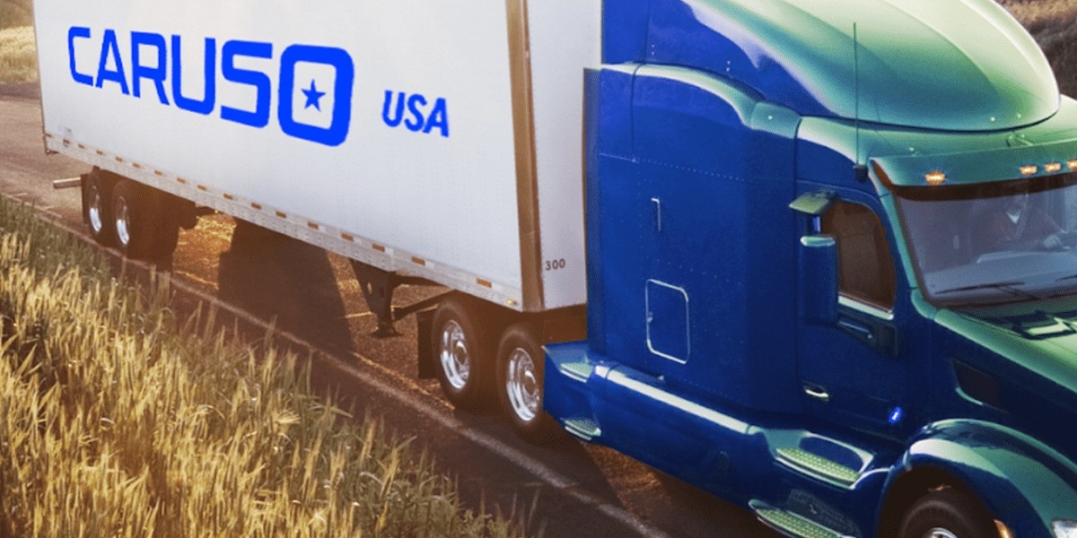 A tractor-trailer with "Caruso USA" written on the side of the trailer.