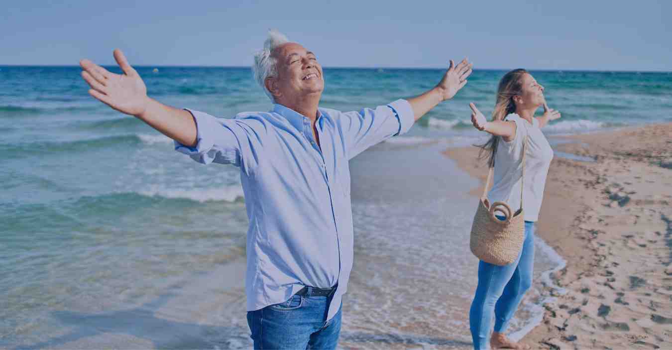 A man & women enjoying time at beach