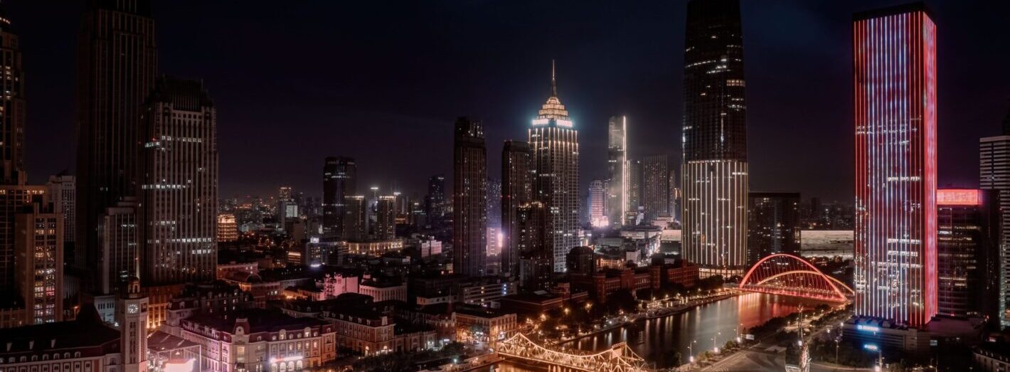 An aerial shot of the Tianjin skyline at night.